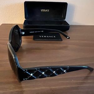 Versace sunglasses. Never worn.